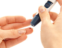 woman checking blood sugar levels